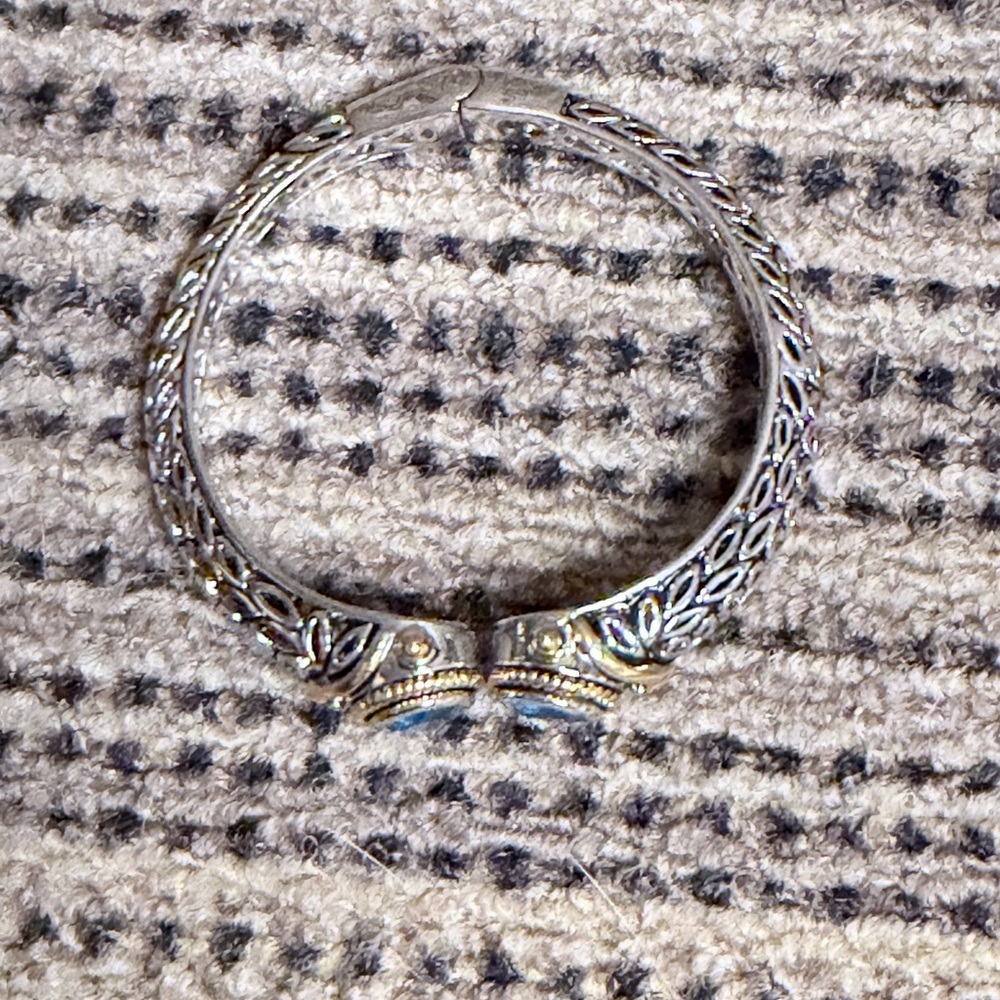 Elegant Silver and Gold Tone Bracelet Blue Accents Dec Birthstone Hinge Bangle - Picture 4 of 10